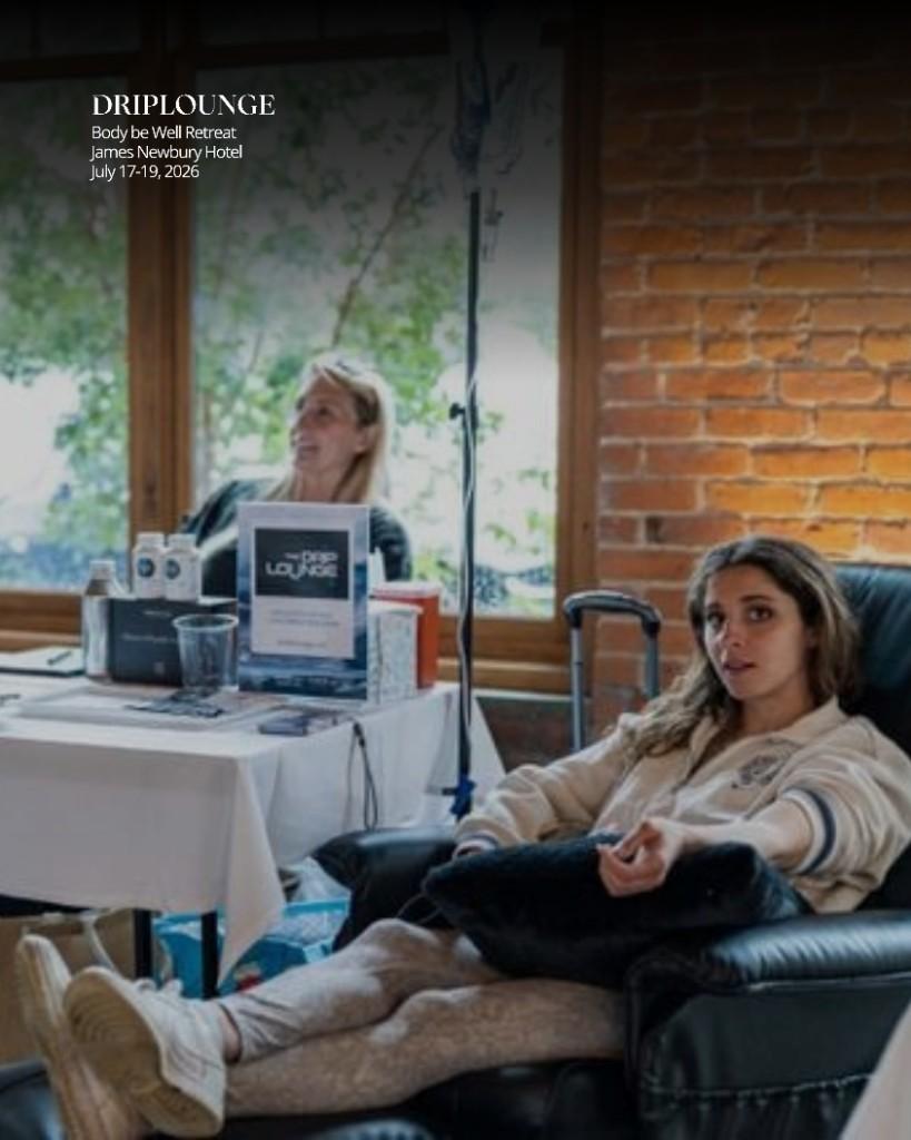 Clinician administering an IV treatment at the Drip Lounge retreat station