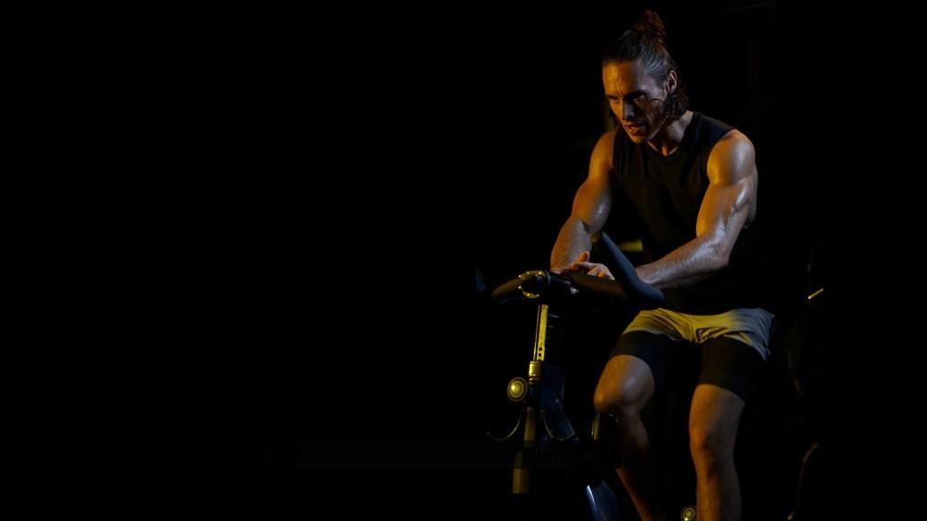 Cyclist on a SoulCycle bike during an intense ride